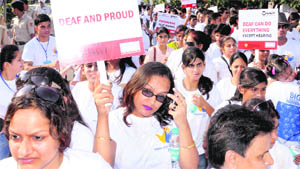 Differently abled persons at an awareness march to mark international day for hearing impaired in Chandigarh on Friday.