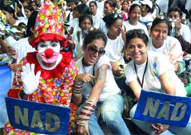 Hearing impaired activists participate in an awareness march organised by the National Association of the Deaf.