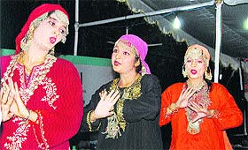 Artistes perform during the three-day annual convention of the Adventure Tour Operators Association of India in Srinagar.