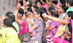 Multipurpose health workers protest against the health department outside the Mini Secretariat