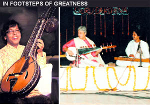 Left: Subhash Ghosh; and (right) in concert with guru Ustad Amjad Ali Khan
