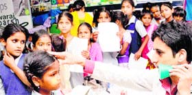 Children being examined at a medical check-up camp in Government Model Senior Secondary School, Sector 8, Chandigarh, on Saturday.