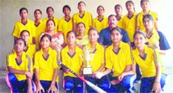 Winners with their trophy in a state-level baseball competition. Photo by writer