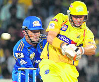 Chennai Super Kings Michael Hussey plays a shot against the Mumbai Indians in Chennai on Saturday. 