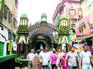 For the crowds, visiting various puja venues in their best clothes is a norm 
