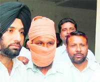 The accused in police custody. 