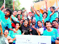 The City Young Football Club team with the Doon Callisto Cup Football Tournament trophy in Dehradun on Sunday