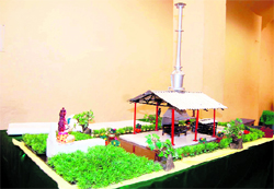 A model of a green crematorium on display at a seminar in Dehradun on Sunday