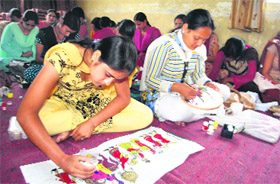 Girls at a Rural Self-Employment Training Institute programme organised by Punjab National Bank in Dharamsala.