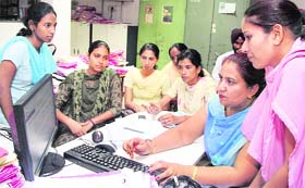 Women police personnel undergo training at the Regional Passport Office in Jalandhar on Saturday