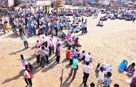 Members of the Sarva Shikhsha Abhiyan/Rashtriya Madhyamik Shiksha Abhiyan Teachers union stage a protest at Samrala Chowk in Ludhiana on Sunday.