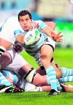 Nicolas Vergallo of Argentina makes a pass during the Rugby World Cup match in Wellington on Sunday.