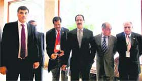 Pakistan Commerce Minister Makhdoom Amin Fahim (centre) with his delegation in Mumbai on Monday