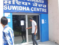A young man reaches the Suwidha Centre in Bathinda on Monday only to find its gate locked due to the strike by the employees.