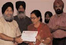Raj Gupta being honoured.