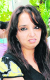 Meenu Bedi, the boys mother, and Geeta Sharma (below), the girls mother, who allegedly assaulted each other at St Stephens School in Chandigarh on Monday.