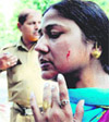 Meenu Bedi, the boys mother, and Geeta Sharma (below), the girls mother, who allegedly assaulted each other at St Stephens School in Chandigarh on Monday.