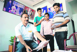 BC Josan with students in the lobby of DAV College at Sector 10 of Chandigarh on Monday