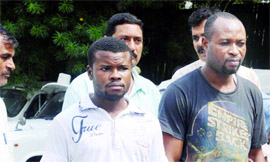 Two Nigerians arrested for drug trafficking at the Police Headquarters in New Delhi on Monday.