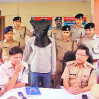 PS Selal, SSP, Haridwar, presents Harvinder Singh Rathi, who was allegedly involved in the killing of the Roorkee Deputy Jailer, before mediapersons in Roorkee 