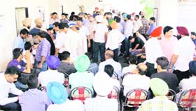 The corridor outside the DTO office was jampacked owing to the auction of fancy numbers of vehicles in Jalandhar on Monday