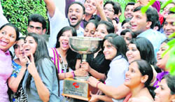 Winners of Koshish in a jubilant mood after winning the trophy at the annual festival of PCTE in Ludhiana