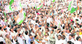 Congress workers march to the state Assembly in Dehradun on Tuesday.
