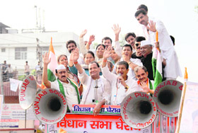 Senior Congress leaders lead party workers in Dehradun on Tuesday.