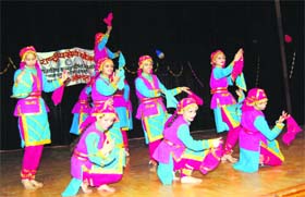 Girls perform during a cultural function at Portmore School in Shimla.