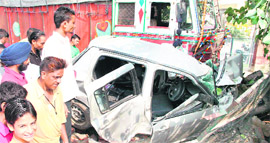 The mangled remains of the Maruti Swift car.