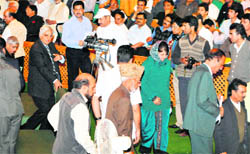 PDP legislators, led by party president Mehbooba Mufti, stage a walkout from the Assembly in Srinagar 