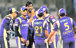Kolkata Knight Riders Lakshmipathy Balaji (C) celebrates taking the wicket of South Australia Redbacks Daniel Harris during their Champions League T20 match in Hyderabad 