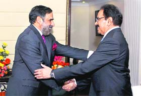 Commerce Minister Anand Sharma with his Pakistani counterpart Makhdoom Amin during a meeting in New Delhi on Wednesday