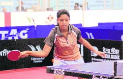 Ahika Mukherjee in a match in the ONGC Indian Junior and Cadet Open-ITTF Premium Junior Circuit-2011 in Dehradun on Wednesday. 