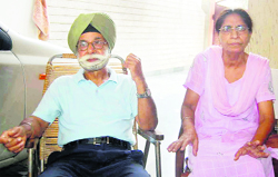 Davinder Kaur, flanked by her husband Bhupinder Singh, narrates her story in Jalandhar on Wednesday