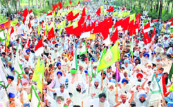 Thousands of farmers block the Patiala-Zirakpur highway on their way to Mohali for a statewide protest to press for their demands