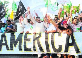 GO, AMERICA GO: Pakistanis shout anti-US slogans during a rally outside the US consulate in Lahore on Wednesday