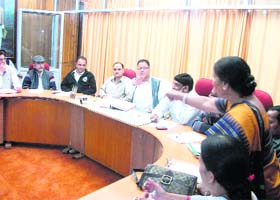 A ward member makes a point at a meeting of the Mussoorie MC on Thursday