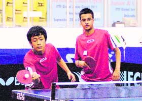 Utkarsh and Lalhun Lua (India B) in the under-15 boys doubles match in the ONGC Indian Junior and Cadet Open-ITTF Premium Junior Circuit-2011 in Dehradun