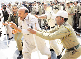 Sheikh Abdul Rashid protests after his resolution could not be taken up for discussion in the Assembly, in Srinagar on Thursday.