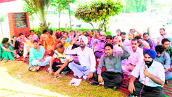 NRHM employees protest on the Jagraon bridge