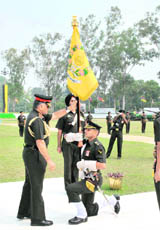 The Chief of Army Staff, Gen VK Singh, presents the Colours to 85 Armoured Regiment in Roorkee on Friday.