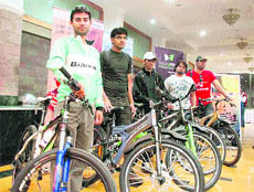 Participants with their cycles on the eve of the launch of Hercules MTB-2011 in Shimla on Friday