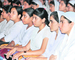 Students take part in the Gandhi Jayanti function organised by the Bharat Vikas Parishad at Government Womens College, Gandhi Nagar, in Jammu on Friday