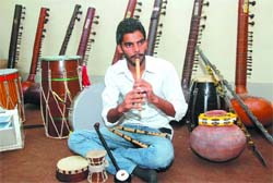 Harbhajan Singh with his musical instruments. 
