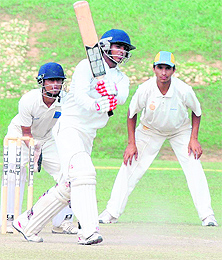 A batsman plays a shot during a match on Saturday.