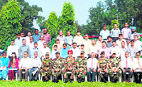Senior officers of the Indian Military Academy with the award-winning civilian staff in Dehradun on Saturday
