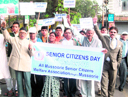 Senior citizens hold a march in Mussoorie on Saturday