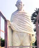 Mahatama Gandhis statue in the Nagar Council premises in Phagwara without specs.