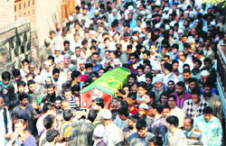 Mourners carry the coffin of Sayeed Mohammad Yousuf, a National Conference worker who allegedly died in police custody, in Bijbehara- Anantnag 